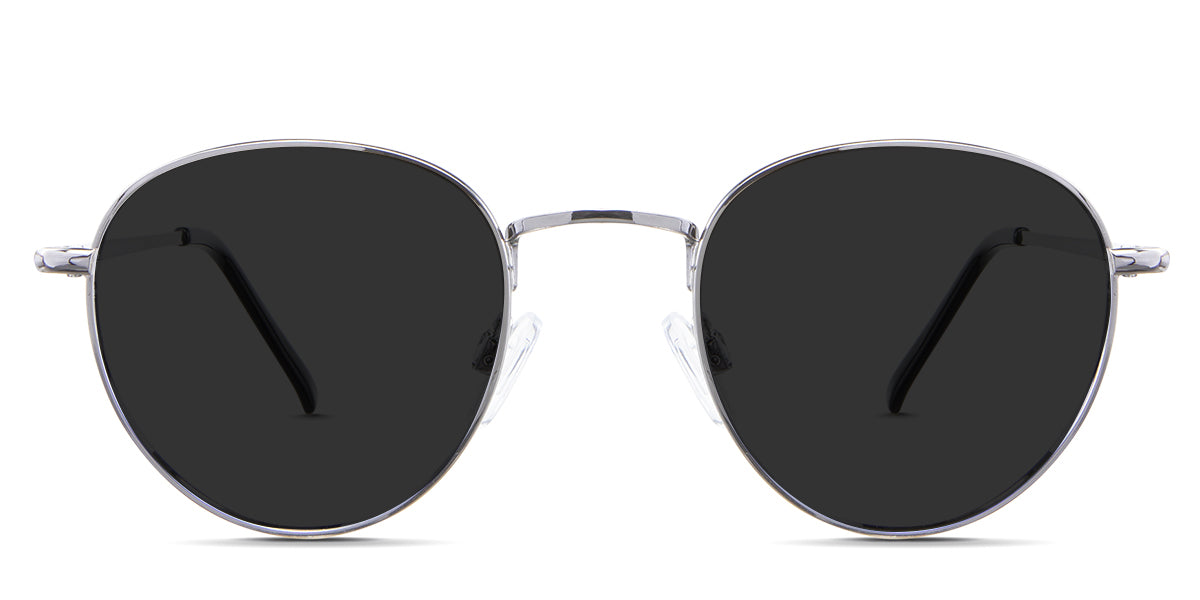 Allison black tinted Standard Solid sunglasses in the Sumi variant - is a round frame with adjustable nose pads and a slim temple arm.
