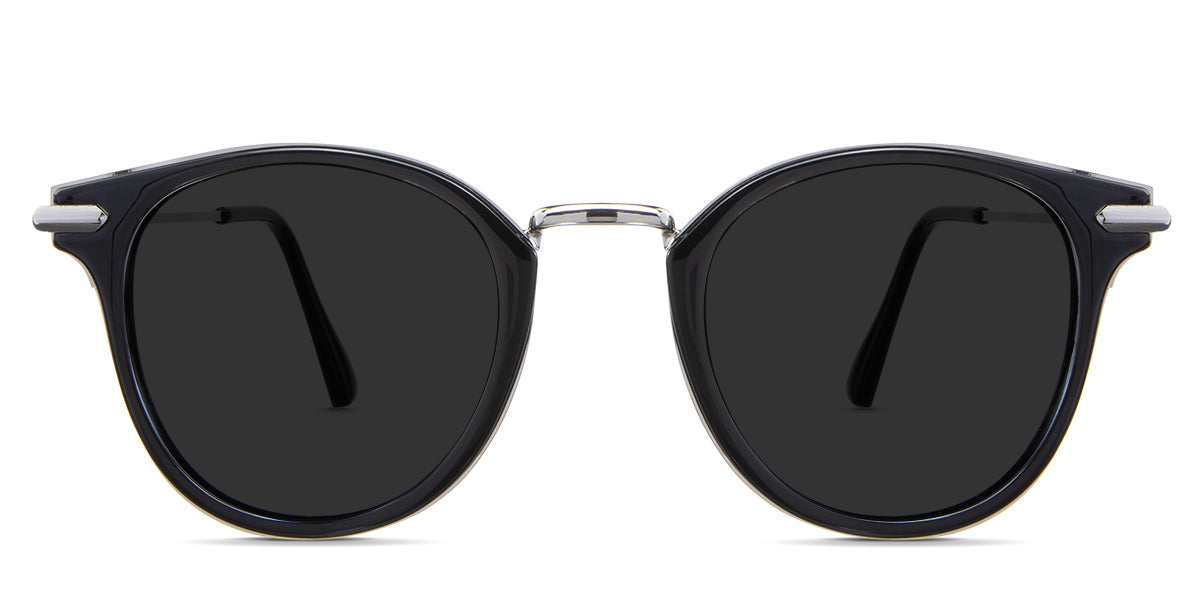Eden black tinted Standard Solid sunglasses in the Roastery variant - it's a round frame with a metal nose bridge and a slim arm.