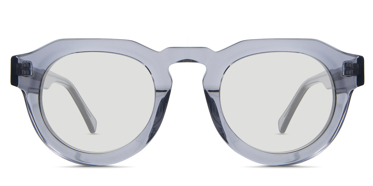 Jax black tinted Standard Solid sunglasses in periwinkle variant - is a narrow transparent frame with high keyhole shaped nose bridge and the crystal temple arms has visible silver wire core 
