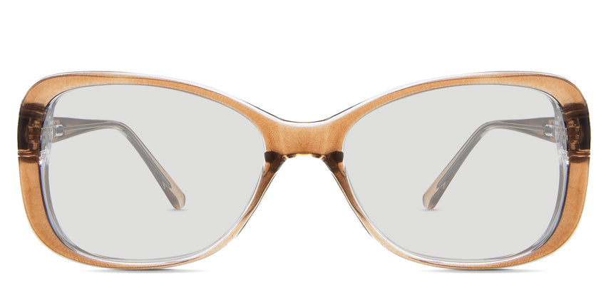 Lois Black tinted Standard Solid in the ocher variant - is a two-toned oval frame with a slim temple arm.