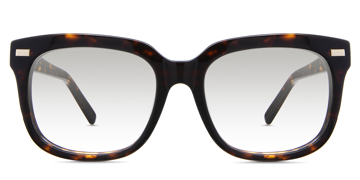 Mun Black tinted Gradient in the sacalia variant - is an acetate frame with a combination of square and oval shapes and a 150mm temple length with a visible wire core.