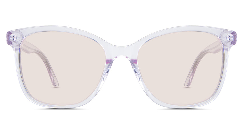 Remi Rose Tinted Standard Solid in the Violet variant - it's a transparent frame with built-in nose pads and a short 140 mm temple arm.