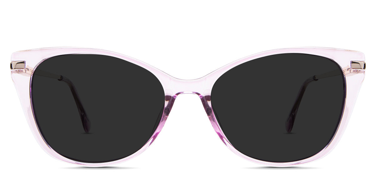 Rishi Gray Polarized in the Camellia variant - is a transparent acetate frame with an oval-shaped viewing lens, a thin metal arm, and wide paddle tips.