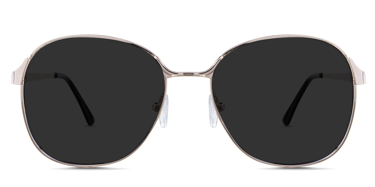 Sara Gray Polarized in the Buff variant - is a metal frame with silicon adjustable nose pads and has a combination of metal and acetate temples.