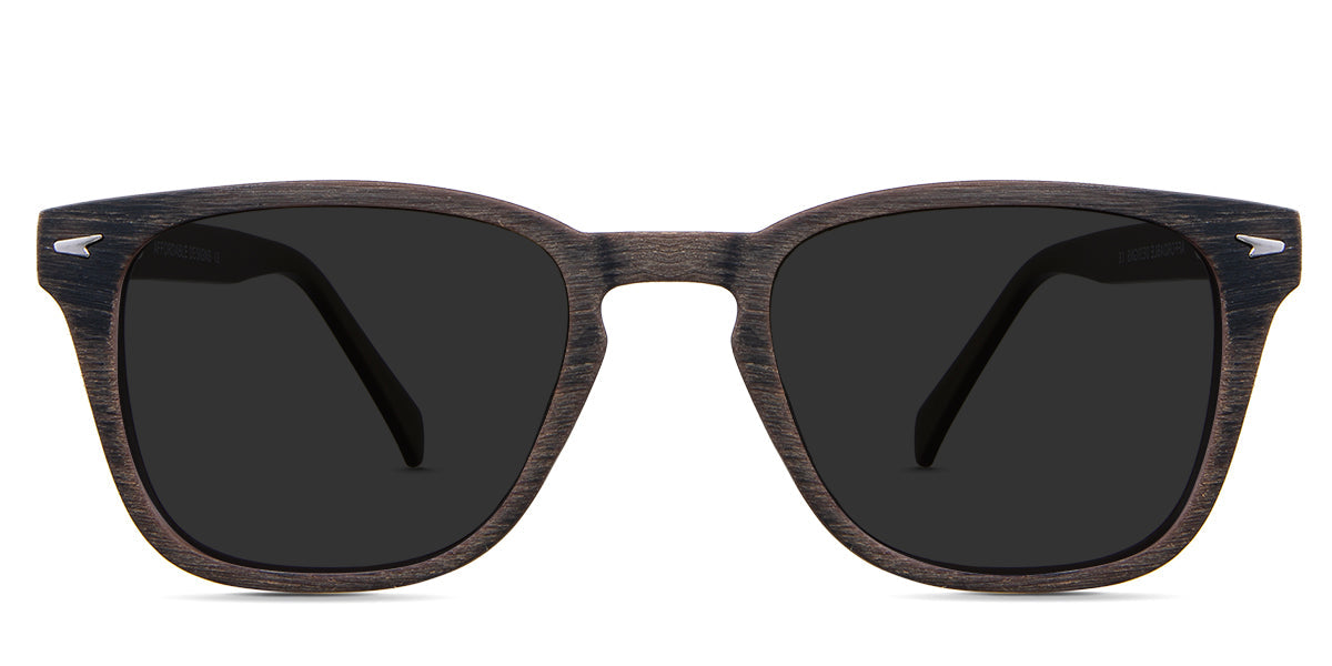 Senecio Gray Polarized in the elmwood variant - it's a square full-rimmed frame with a wooden pattern and a metal emboss in the end piece.