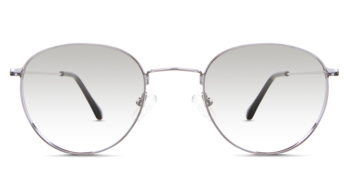 Sol black tinted Gradient in the Silver variant - is a full-rimmed metal frame with a wide nose bridge and a combination of a metal arm and acetate tips.