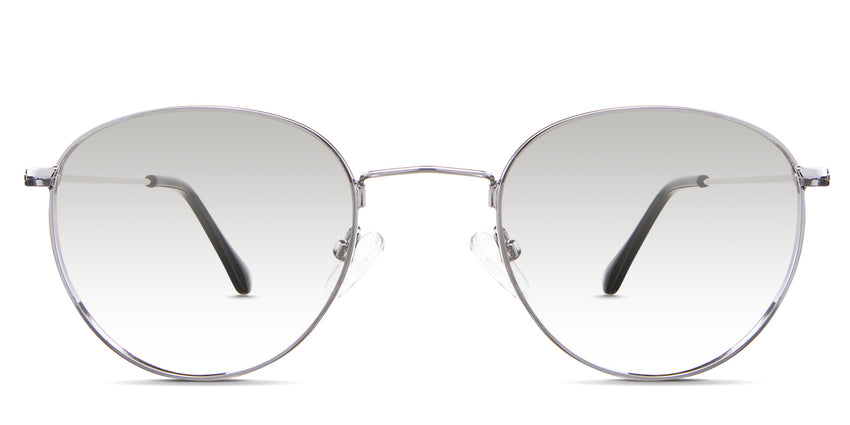 Sol black tinted Gradient in the Silver variant - is a full-rimmed metal frame with a wide nose bridge and a combination of a metal arm and acetate tips.