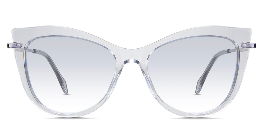 Susan Blue Tinted Gradient in the Crystal variant - is a cat-eye frame with a U-shaped nose bridge and a combination of metal arm and acetate tips.