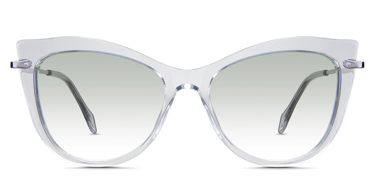 Susan Green Tinted Gradient in the Crystal variant - is a cat-eye frame with a U-shaped nose bridge and a combination of metal arm and acetate tips.