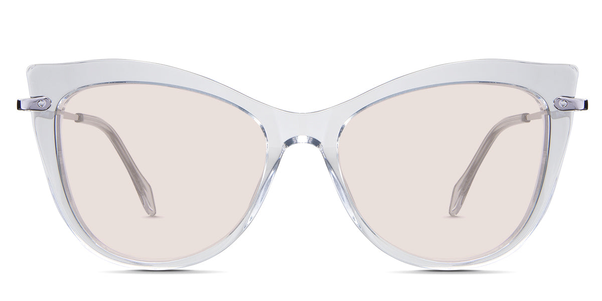 Susan Rose Tinted Solid in the Crystal variant - is a cat-eye frame with a U-shaped nose bridge and a combination of metal arm and acetate tips.