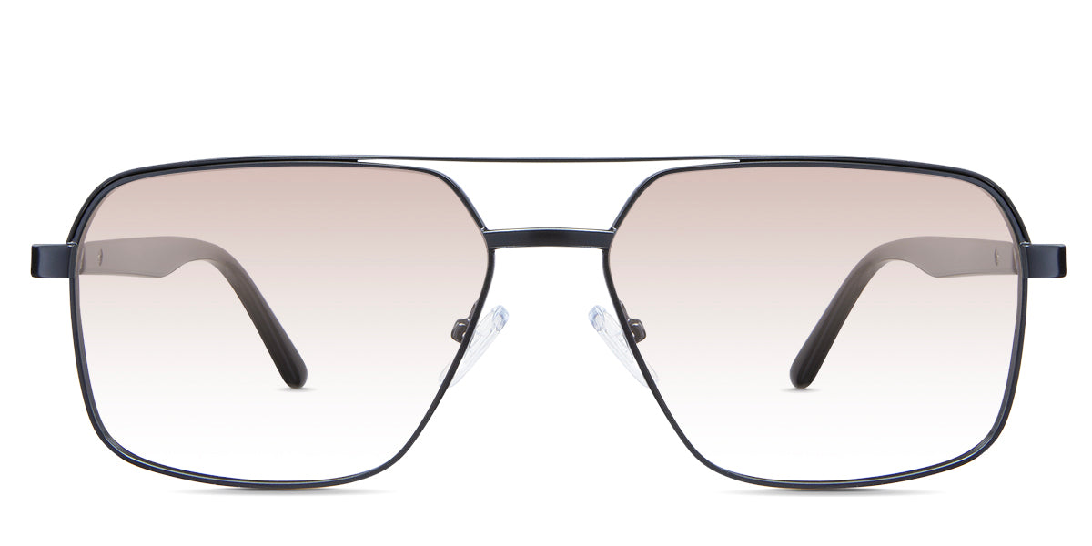 Xavier Rose Tinted Gradient in the Ursus variant - it's a rectangular frame with a two-bar metal bridge and a whole acetate temple.