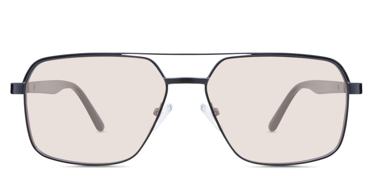 Xavier Rose Tinted Solid in the Ursus variant - it's a rectangular frame with a two-bar metal bridge and a whole acetate temple.