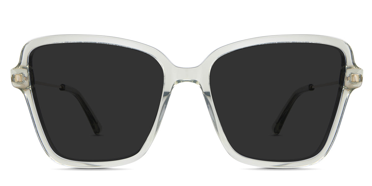 Zina Gray Polarized in the olive variant - it's a wide acetate cat-eye shape frame with a thin metal temple arm.