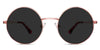 Larsen black tinted Standard Solid sunglasses in cyclamen variant - it's round wired frame
