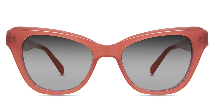 Ada Black Sunglasses Gradient in the ruby variant - it's a cat-eye frame with clear built-in nose pads and a broad temple arm.