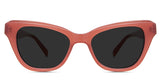 Ada Gray Polarized in the ruby variant - it's a cat-eye frame with clear built-in nose pads and a broad temple arm.