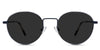 Adler Black Sunglasses Standard  Solid in the Capri variant - it's a round frame with a high nose bridge and a slim metal arm and acetate tips.