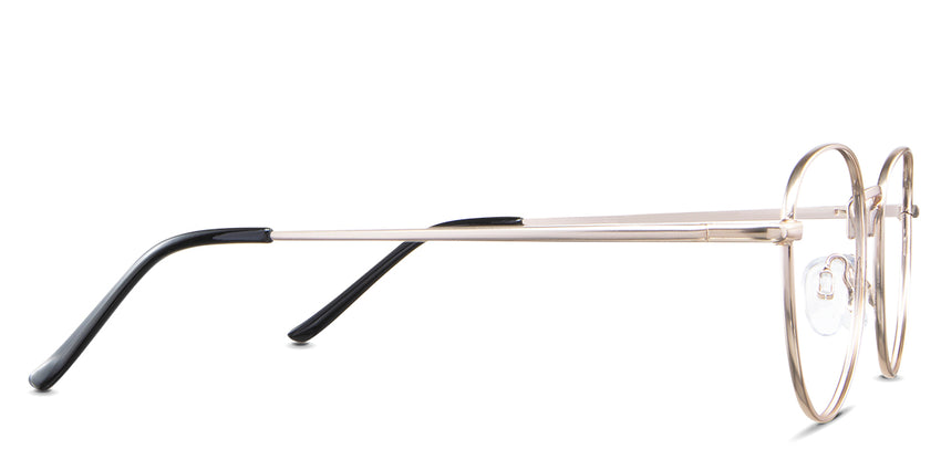 Allison eyeglasses in the mimosa variant - have a gold temple arm and black temple tips.