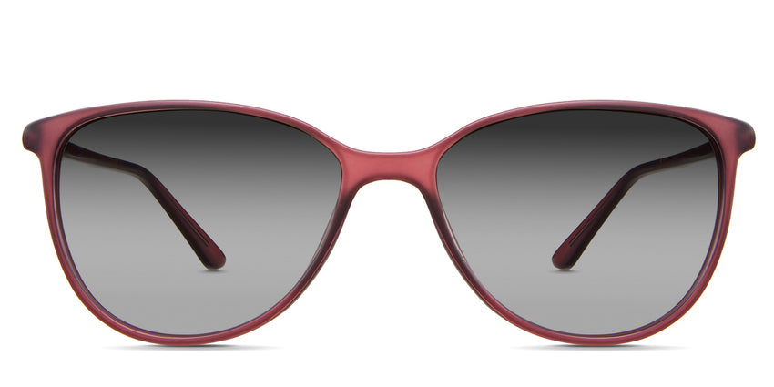 Amara black tinted Gradient sunglasses in the Rhodolite variant - it's a lightweight oval frame with a low nose bridge and a built-in nose pad.