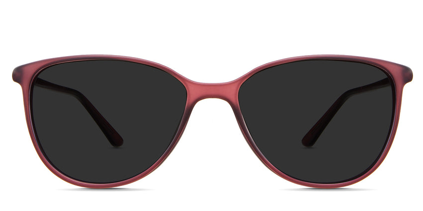 Amara  black tinted Standard Solid sunglasses in the Rhodolite variant - it's a lightweight oval frame with a low nose bridge and a built-in nose pad.
