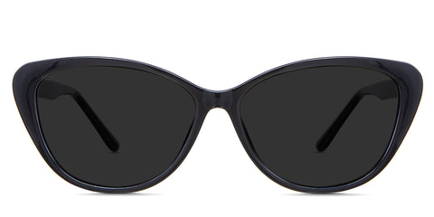 Amber black tinted Standard Solid sunglasses in the Midnight variant - it's an acetate frame with a U-shaped nose bridge and paddle-shaped temple tips.
