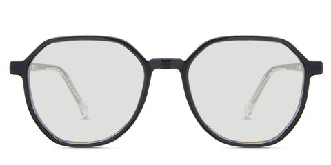 Ash black tinted Standard Solid glasses in the Basalt variant - is a geometric acetate frame with a wide viewing lens and a slim temple arm with frame info imprint inside the left arm.