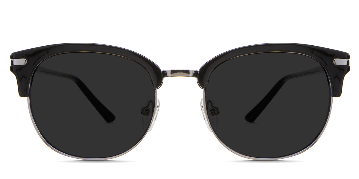 Bayler black tinted Standard Solid sunglasses in the chelus variant - it's a full-rimmed half acetate and half metal frame with adjustable nose pads.