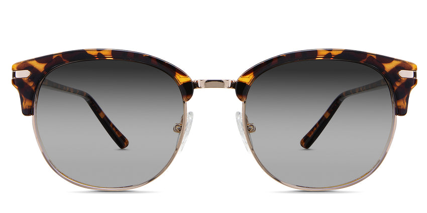 Bayler black tinted Gradient sunglasses in the chelus variant - it's a full-rimmed half acetate and half metal frame with adjustable nose pads.