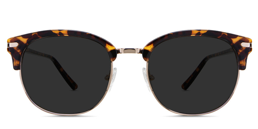 Bayler black tinted Standard Solid sunglasses in the chelus variant - it's a full-rimmed half acetate and half metal frame with adjustable nose pads.