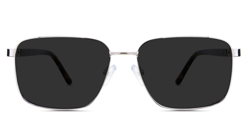 Benjamin black tinted Standard Solid sunglasses in the Saturn variant - is a rectangular frame with a narrow nose bridge and slim temples.