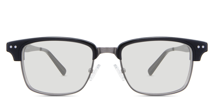 Brad black tinted Standard Solid glasses in the Cormorant variant - is rectangular and combines metal arm and acetate temple tips.