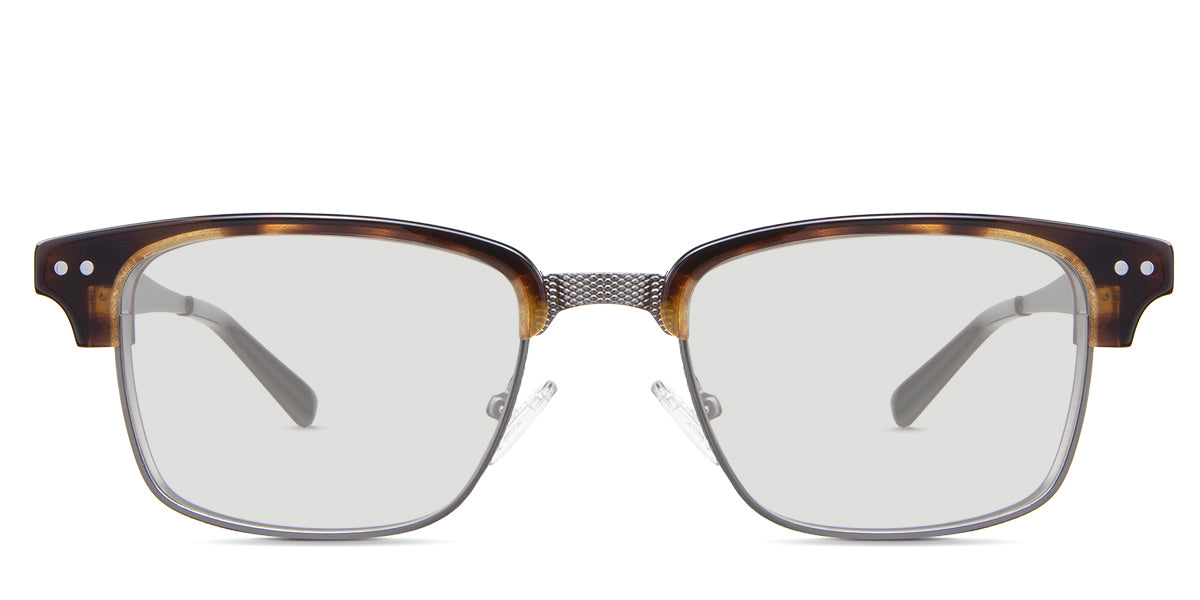 Brad black tinted Standard Solid glasses in the Manouria variant - is a full-rimmed medium-sized frame with diamond emboss in the bridge, a broad metal arm, and regular thick acetate tips.