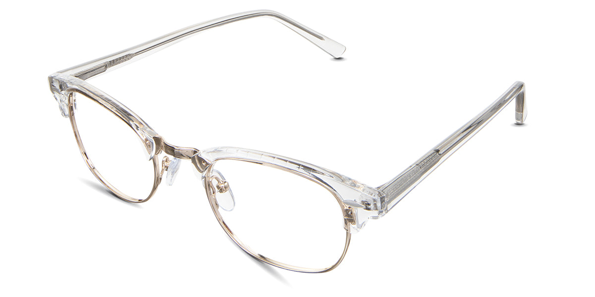 Brice eyeglasses in the moissanite variant - have a gold metal full-rimmed frame and a crystal acetate half-rimmed frame.