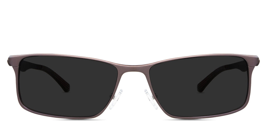 Briggs Gray Polarized in the Toffee variant - is a full-rimmed frame with a narrow nose bridge, a metal arm, and acetate tips.