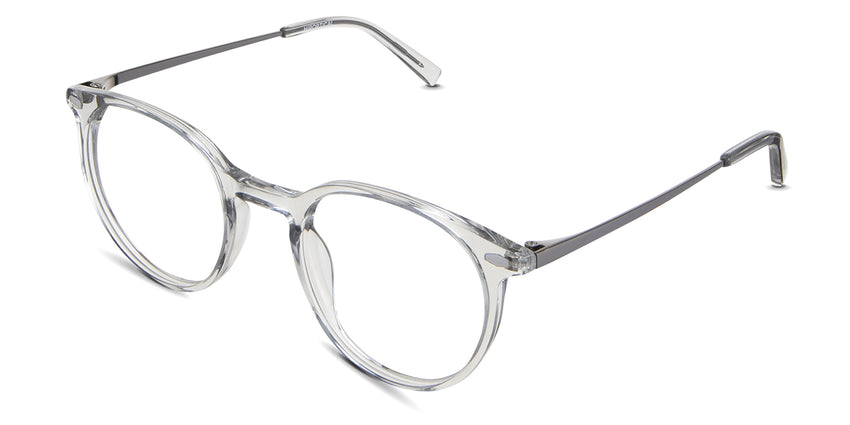 Cobo eyeglasses in the cloudsea variant have a colorless acetate rim, acetate tips, and silver metal arm.