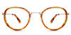 Corry eyeglasses in funky style comes with different shades of yellow and orange color on round frame