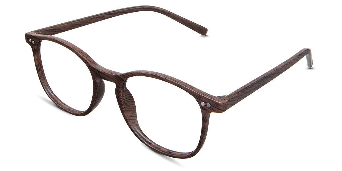 Coven Eyeglasses in the sealywood variant - it's a thin frame with a wide nosebridge.