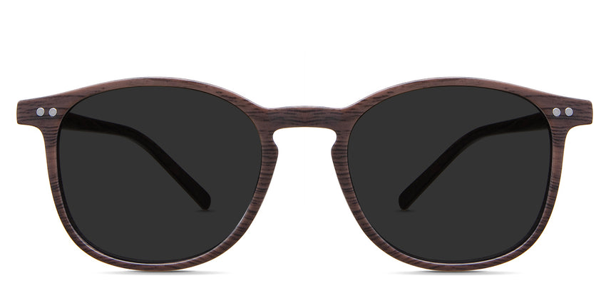 Coven black tinted Standard Solid sunglasses in the sealywood variant - it's a thin round frame with a wide nose bridge and a slim temple arm that is 140mm long.