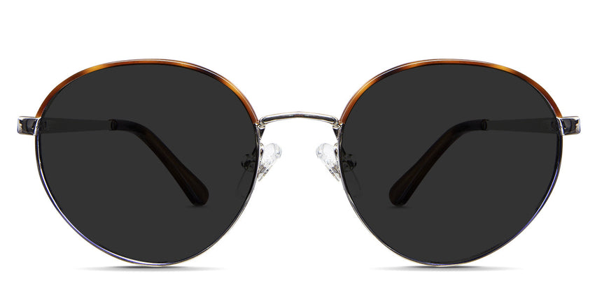 Coyle Gray Polarized in the Earthen variant - it's a round frame with a flat, wide nose bridge and a regular broad temple arm.