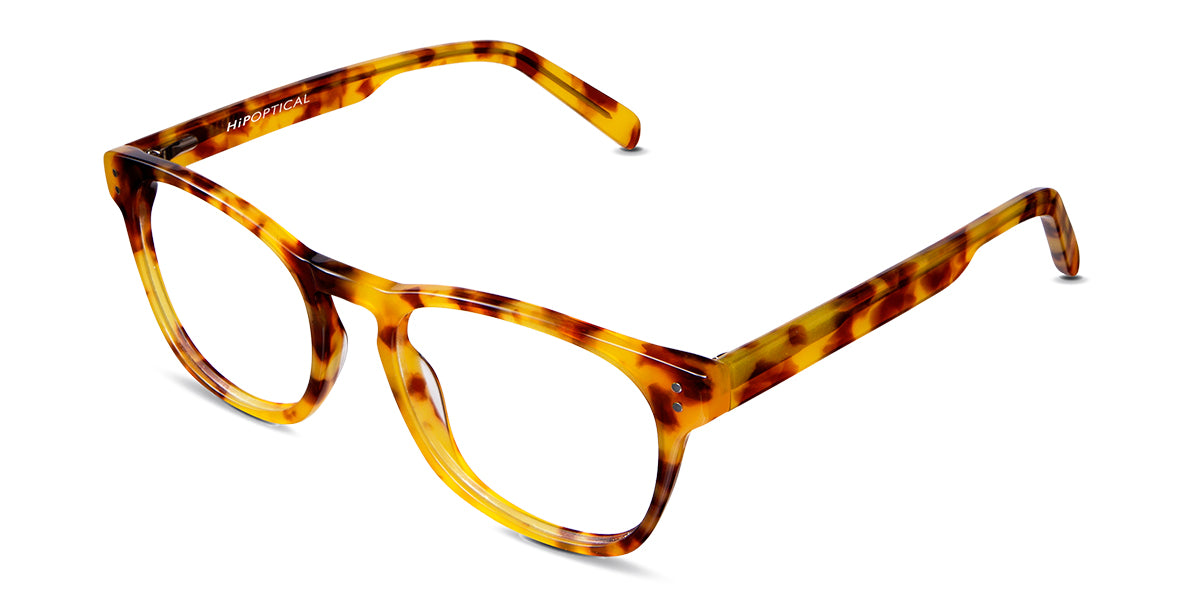 Delevan eyeglasses in the forsythia variant - it's an acetate oval frame in tortoise color.
