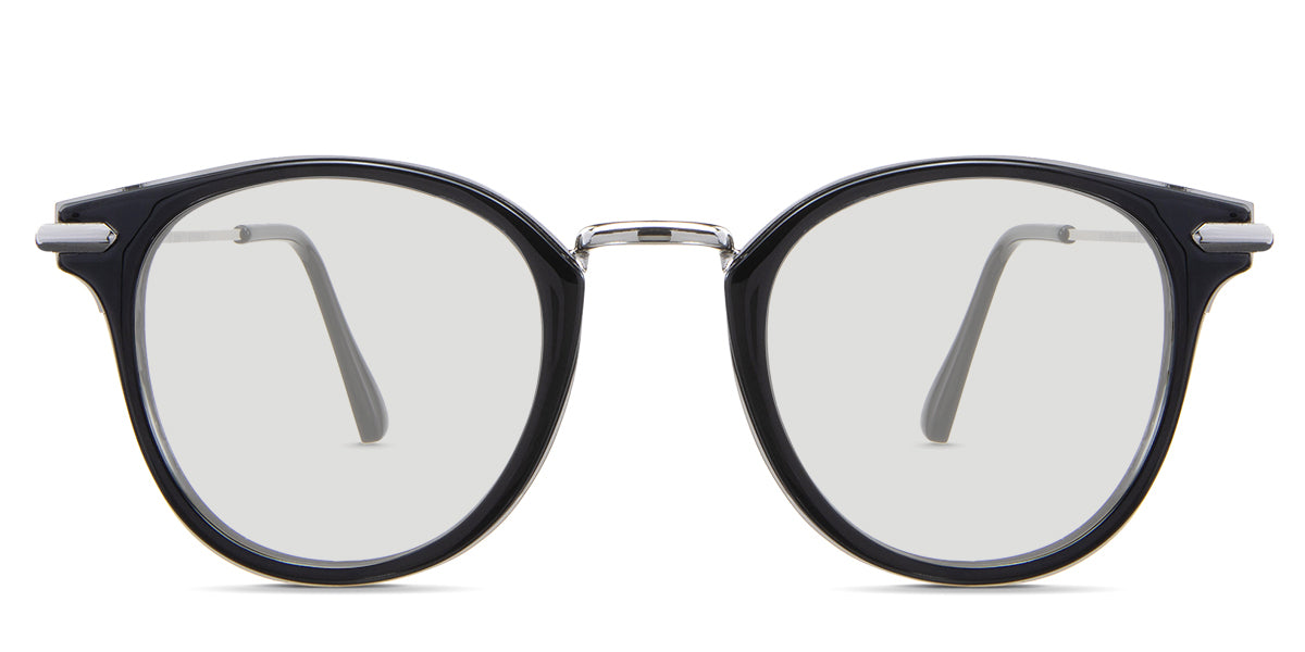 Eden black tinted Standard Solid glasses in the Roastery variant - it's a round frame with a metal nose bridge and a slim arm.