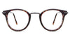 Eden eyeglasses in the roastery variant - it's a round frame in tortoise and gun color.