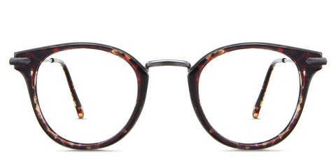 Eden eyeglasses in the roastery variant - it's a round frame in tortoise and gun color.