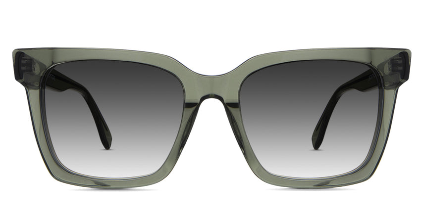 Edna black tinted Gradient sunglasses in the midori variant - is a square transparent frame with a V-shaped nose bridge and a built-in nose pad.