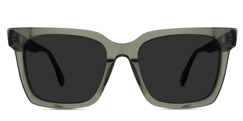Edna black tinted Standard Solid sunglasses in the midori variant - is a square transparent frame with a V-shaped nose bridge and a built-in nose pad.
