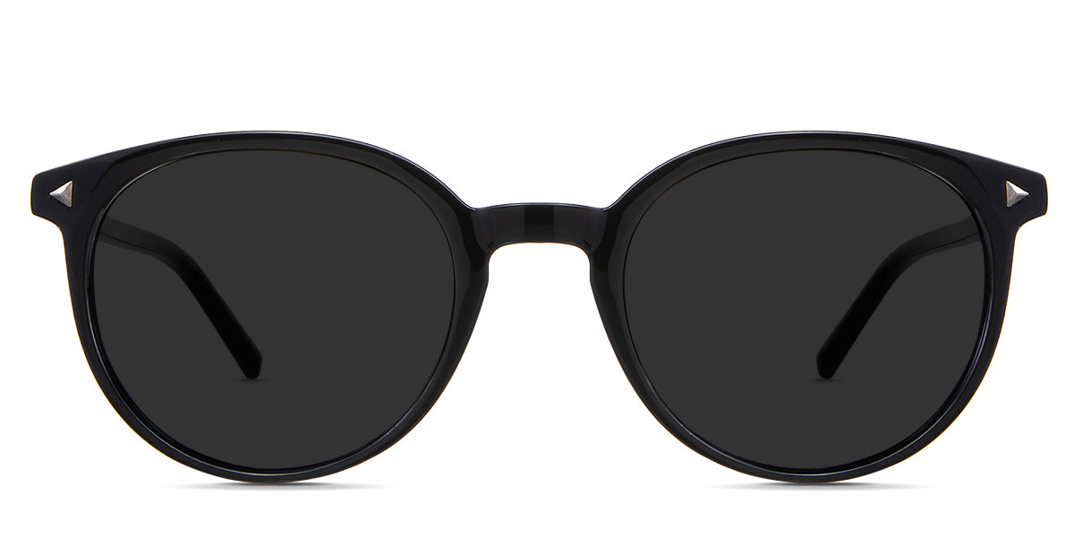 Elex gray Polarized in the Crystal variant - is a round medium-size frame with triangle decorative rivet embosses at the end piece and has a slim temple.