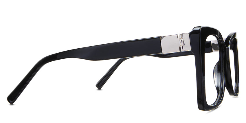 Ella eyeglasses in the licorice variant - have a decorative metal connecting the hinge to the arm.