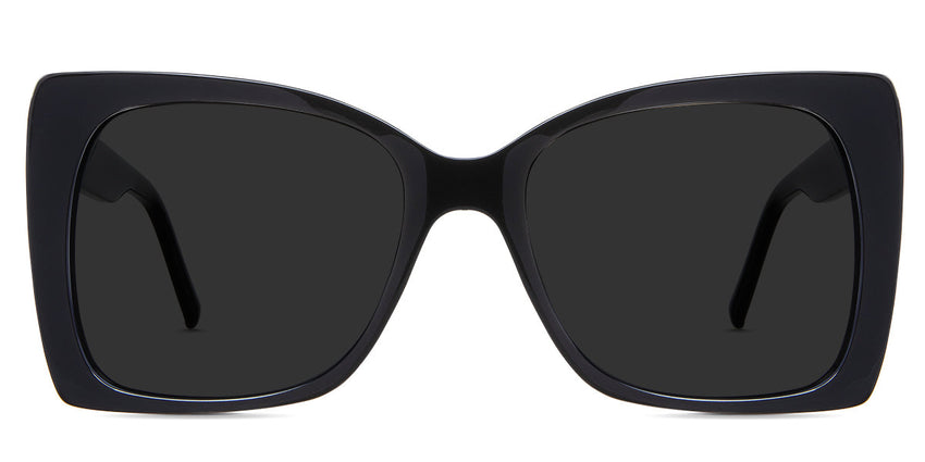 Ella Gray Polarized in the Licorice variant - is an acetate frame with an 18mm width nose bridge and a decorative metal connecting the hinge to the arm.