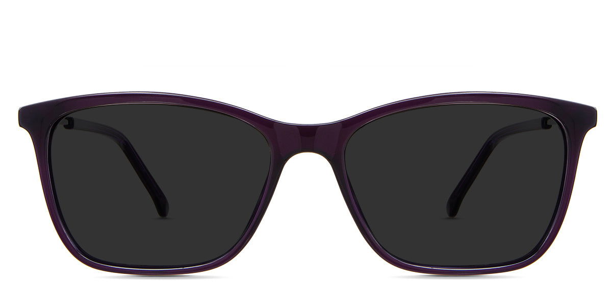 Elle black tinted Standard Solid sunglasses in the amethyst variant - it's a rectangular frame with an acetate rim and a metal temple.