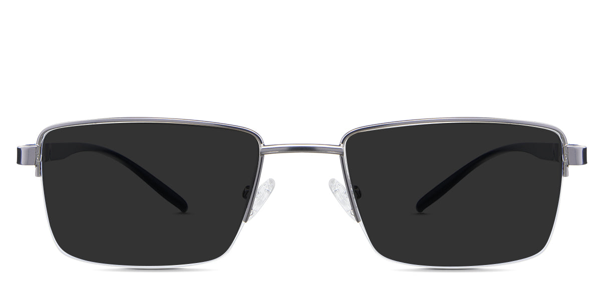 black tinted Standard Solid sunglasses in cemani variant - it's a rectangular frame with a straight and wide nose bridge and an acetate arm with a metal stripe pattern.